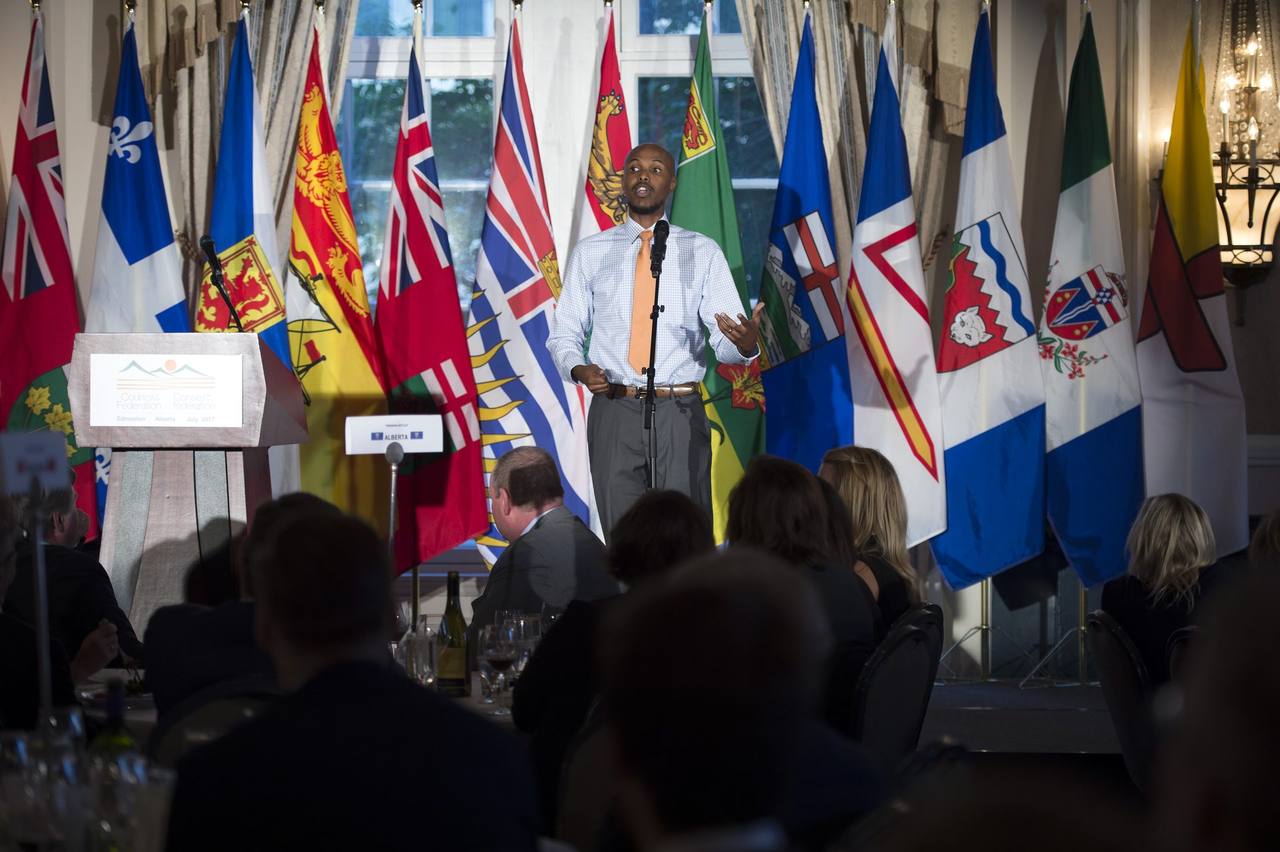 Ahmed Knowmadic Ali performing at the Council of Federations